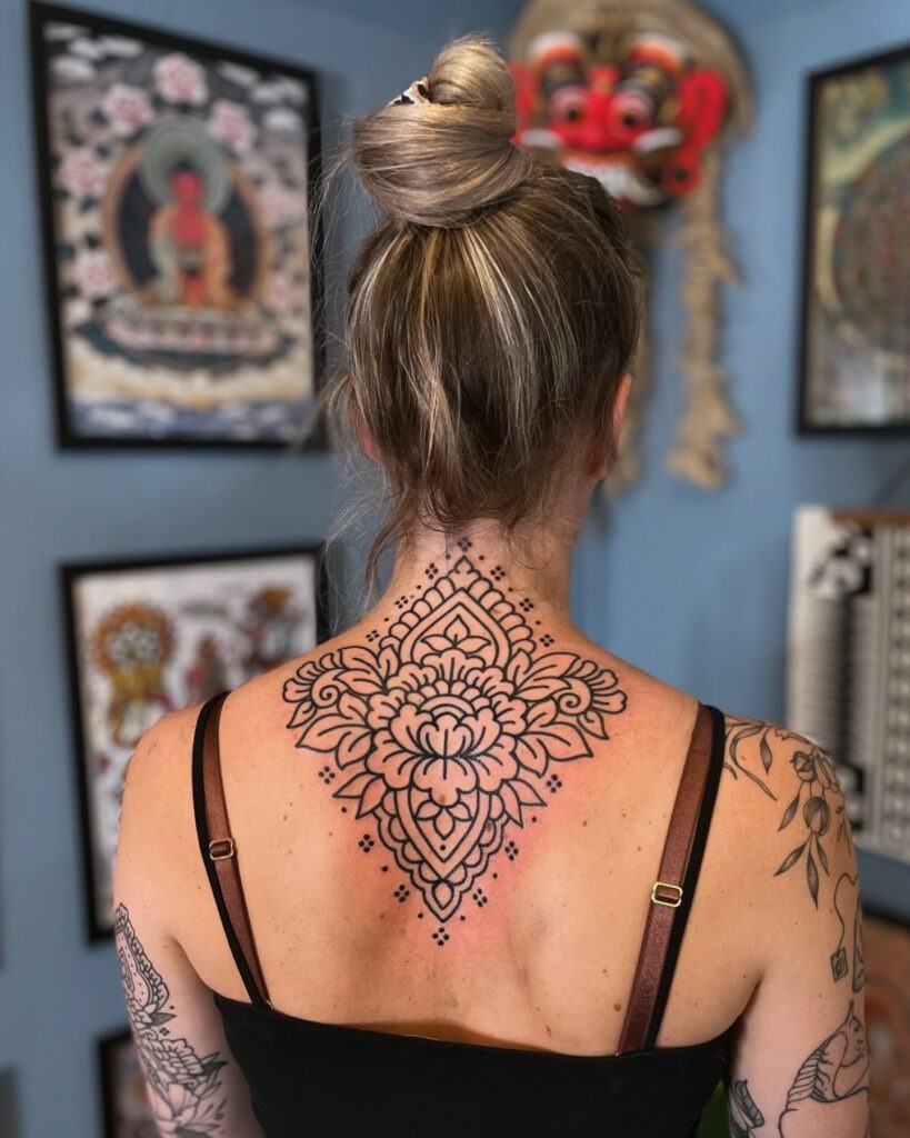 Upper Back Mandala Tattoo with Bold Linework Tattoo Design