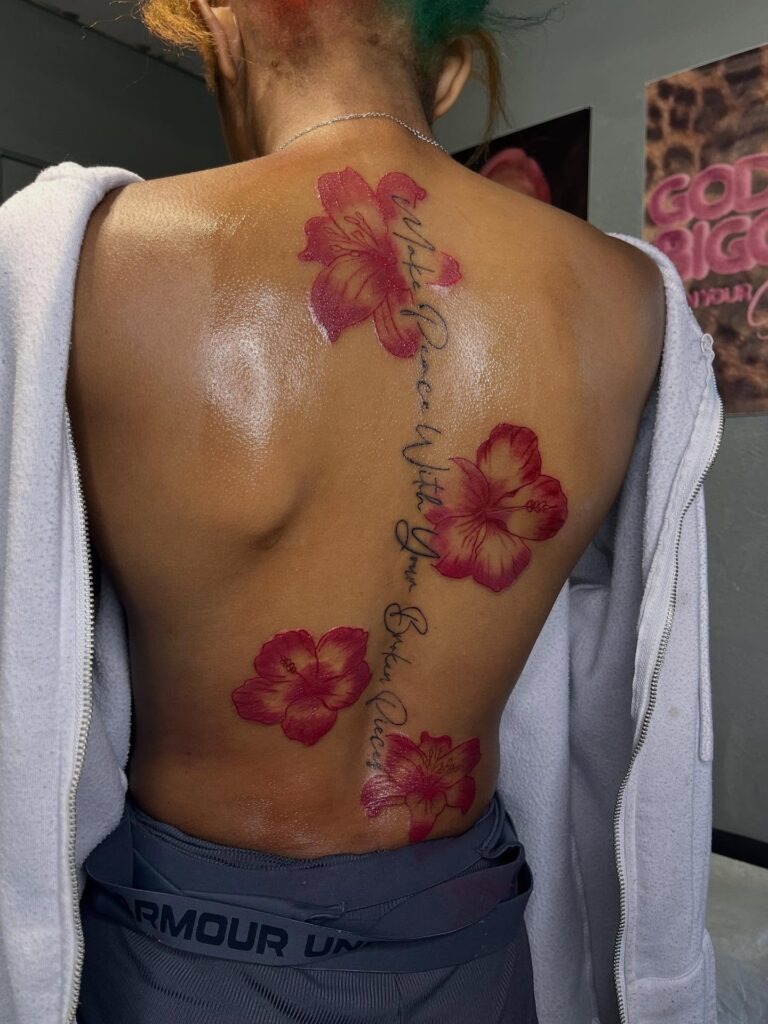 Vivid Hibiscus Flowers with Script Back Tattoo Tattoo Design