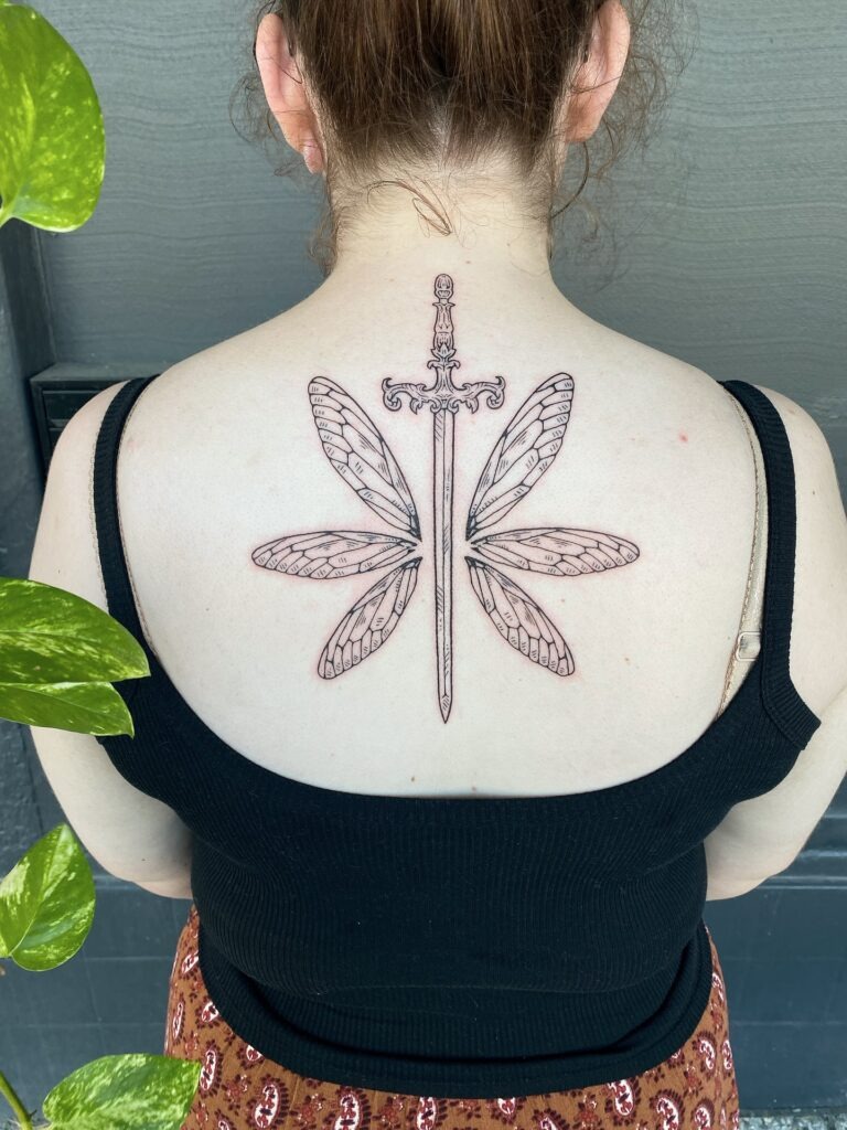 Whimsical Winged Sword Tattoo Tattoo Design