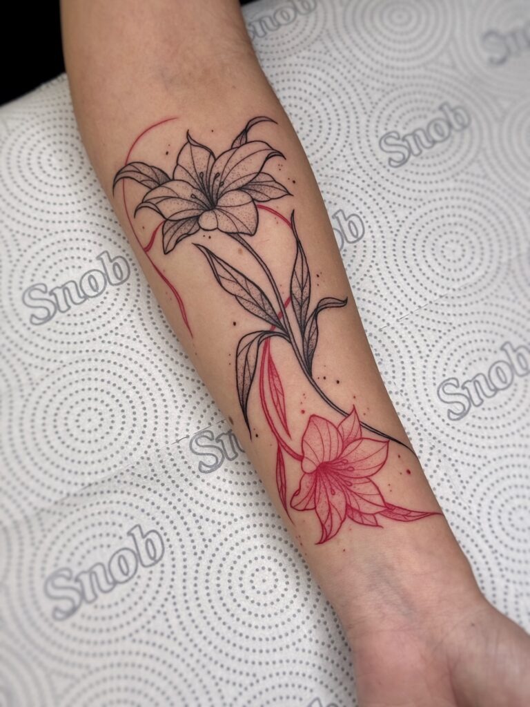 Dual Lily Fine Line Tattoo with Red Accents Tattoo Design
