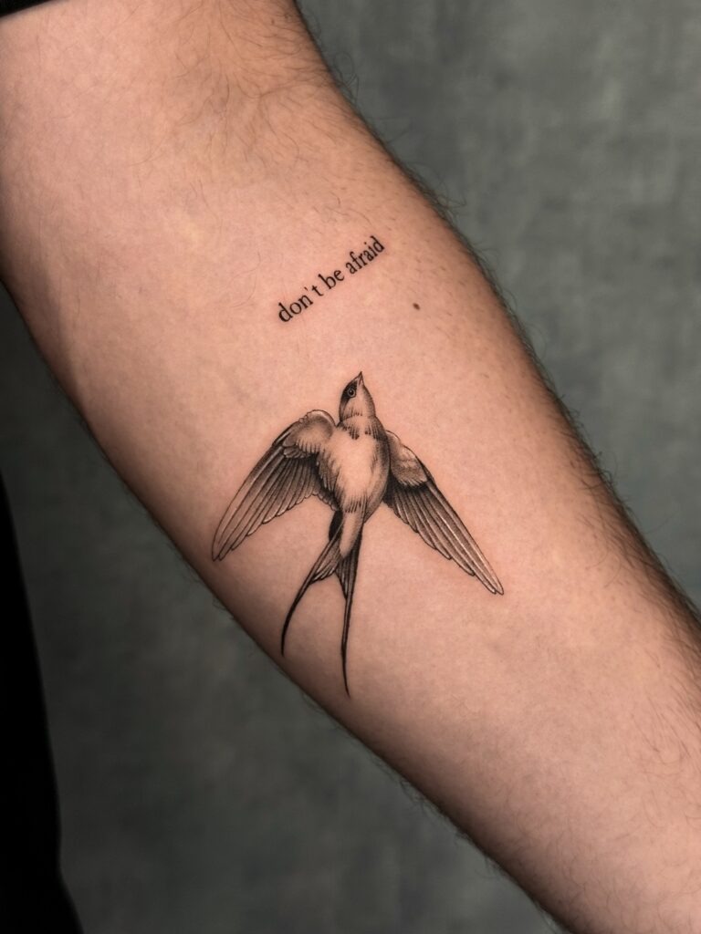 Swallow with Motivational Script Tattoo Design