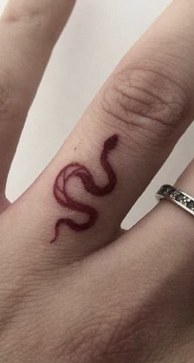 Burgundy Snake Finger Tattoo Tattoo Design