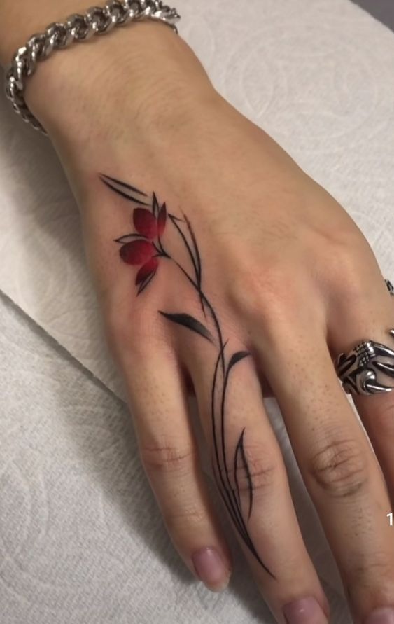 Elegant Red Flower Finger Tattoo Tattoo Design