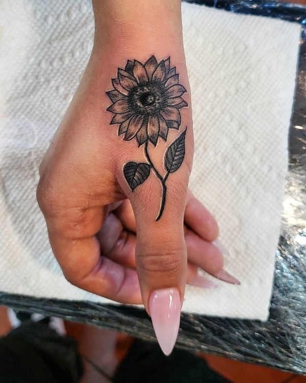 Sunflower Thumb Tattoo Tattoo Design