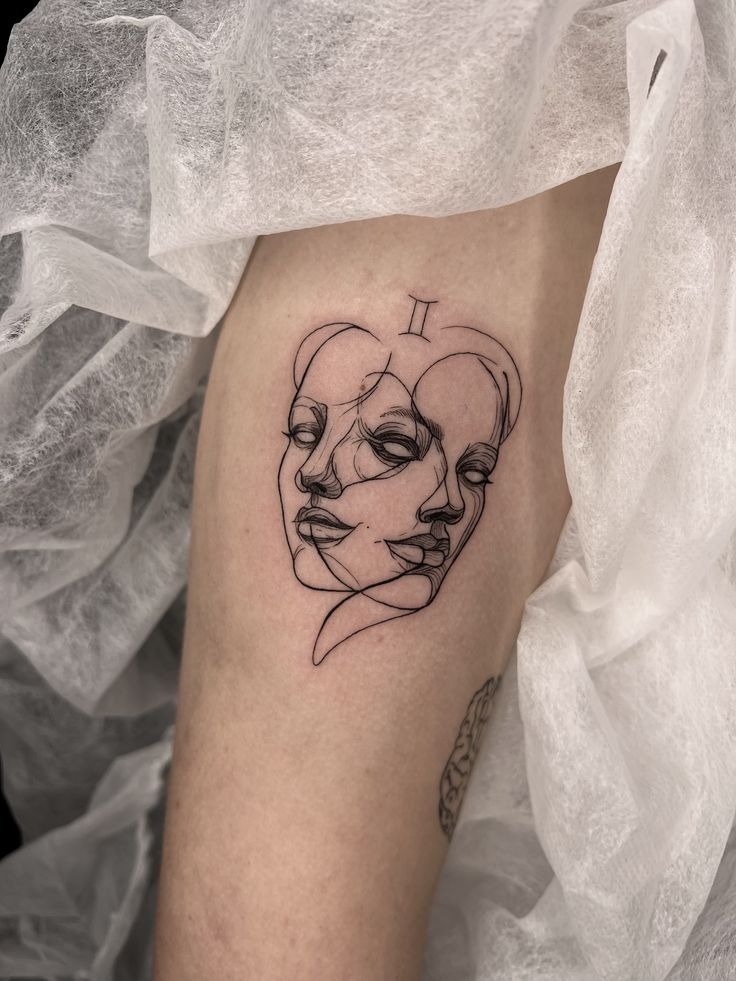 Fine Line Twin Faces Tattoo Tattoo Design