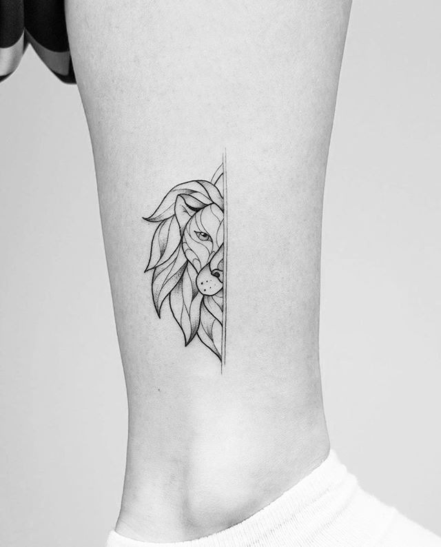 Symmetrical Minimalism: Split Lion Face Tattoo Design
