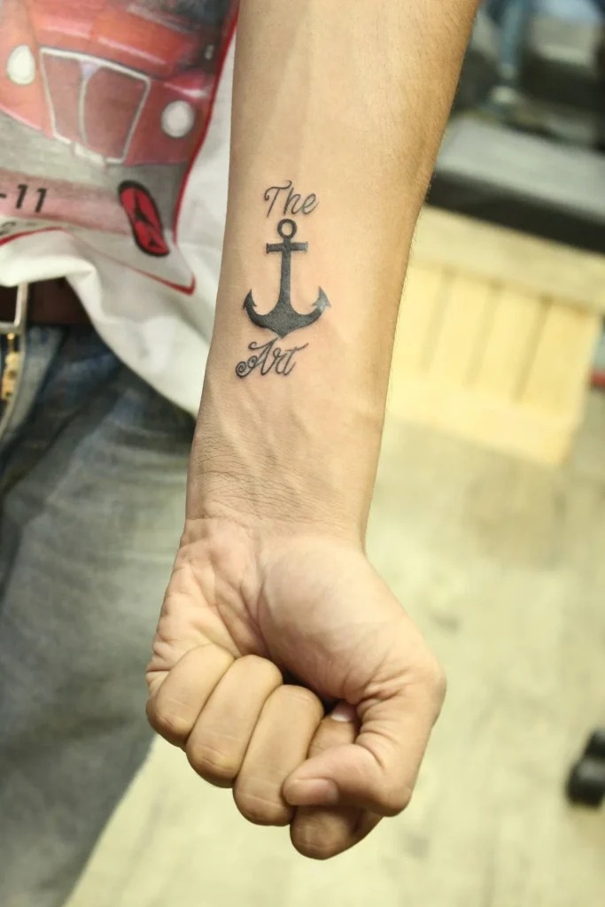 Anchor with "The Art" on Forearm Tattoo Design