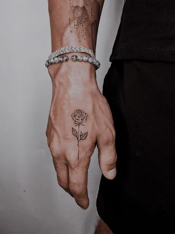 Delicate Rose on Hand Tattoo Design