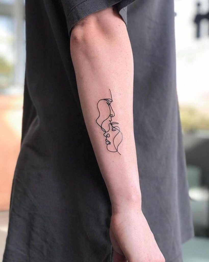 Minimalist Line Art Faces on the Forearm Tattoo Design
