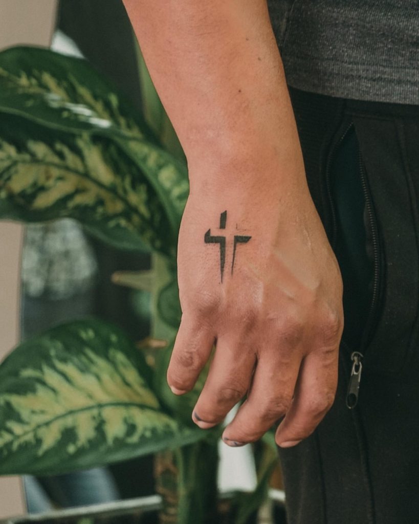 Simple Cross on Hand Tattoo Design