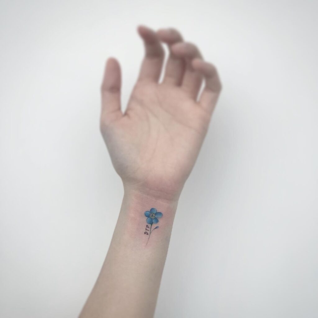 Blue Forget-Me-Not Flower Wrist Tattoo Tattoo Design
