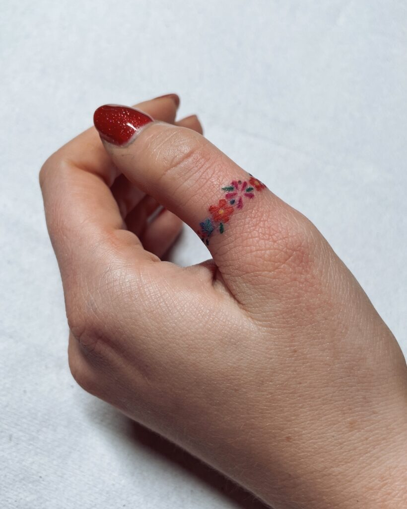 Floral Ring Finger Tattoo Tattoo Design