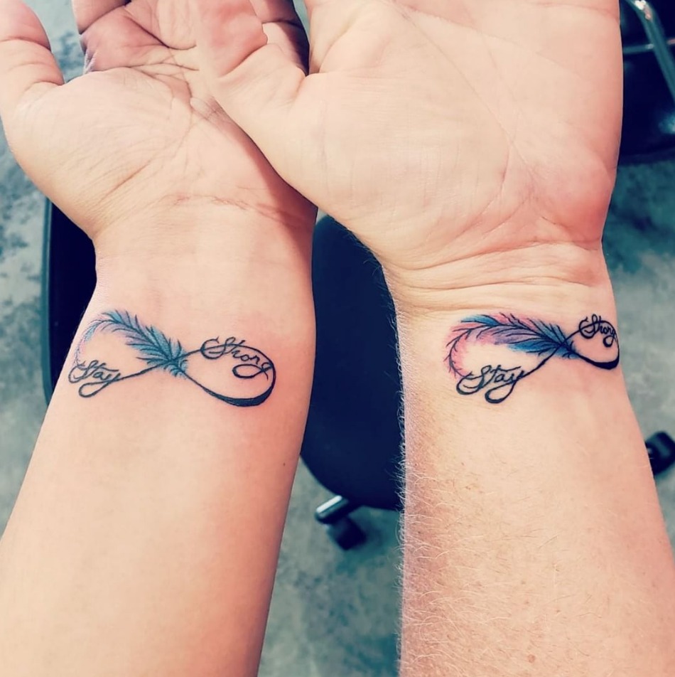 Inspirational Feather Design Tattoo Design