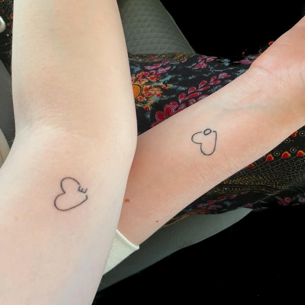 Playful Family Silhouette Tattoo Design