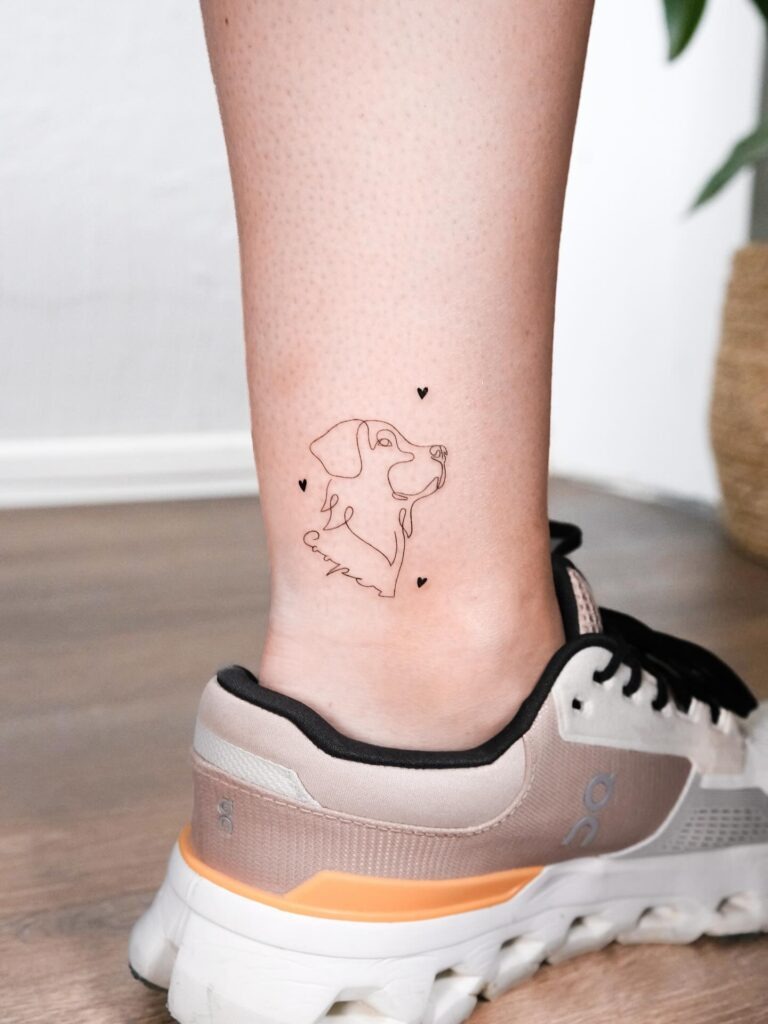 One Line Dog Tattoo with Name and Hearts Tattoo Design