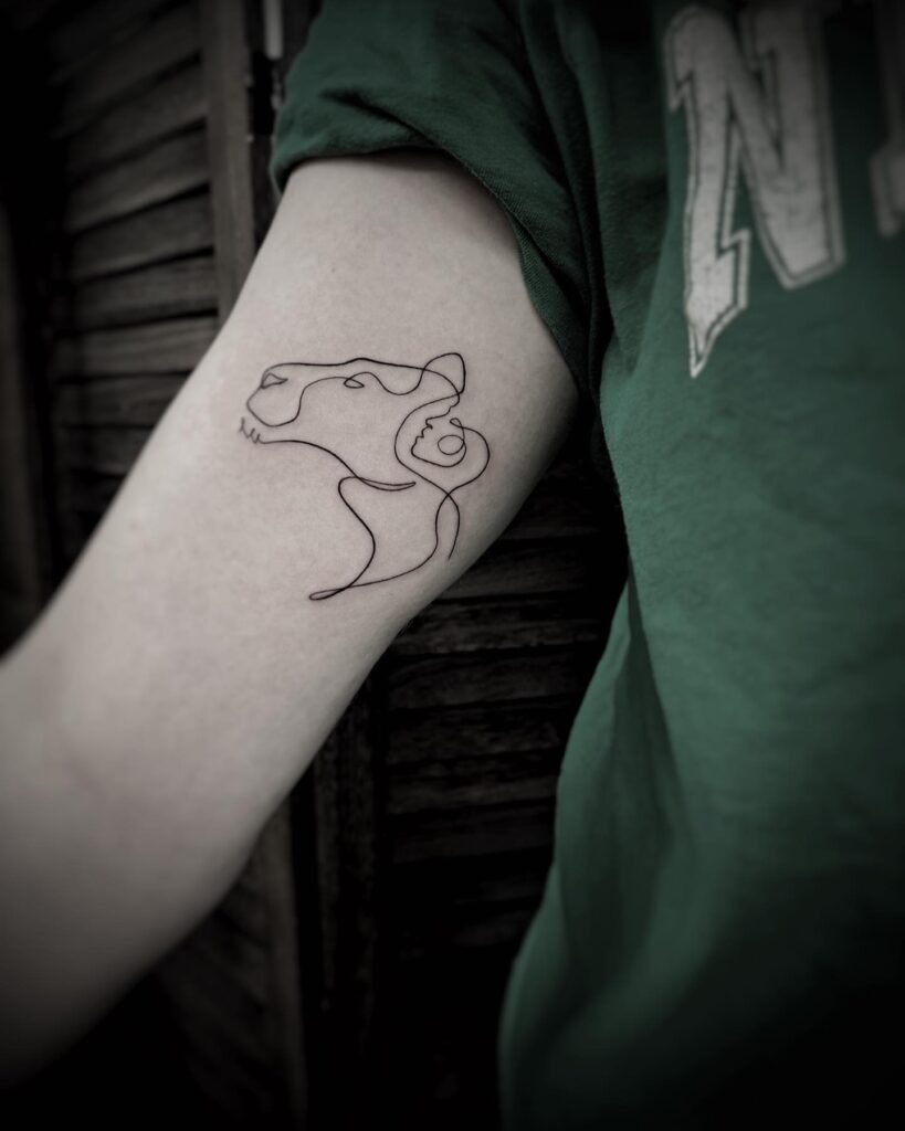 One Line Lion and Person Tattoo Tattoo Design