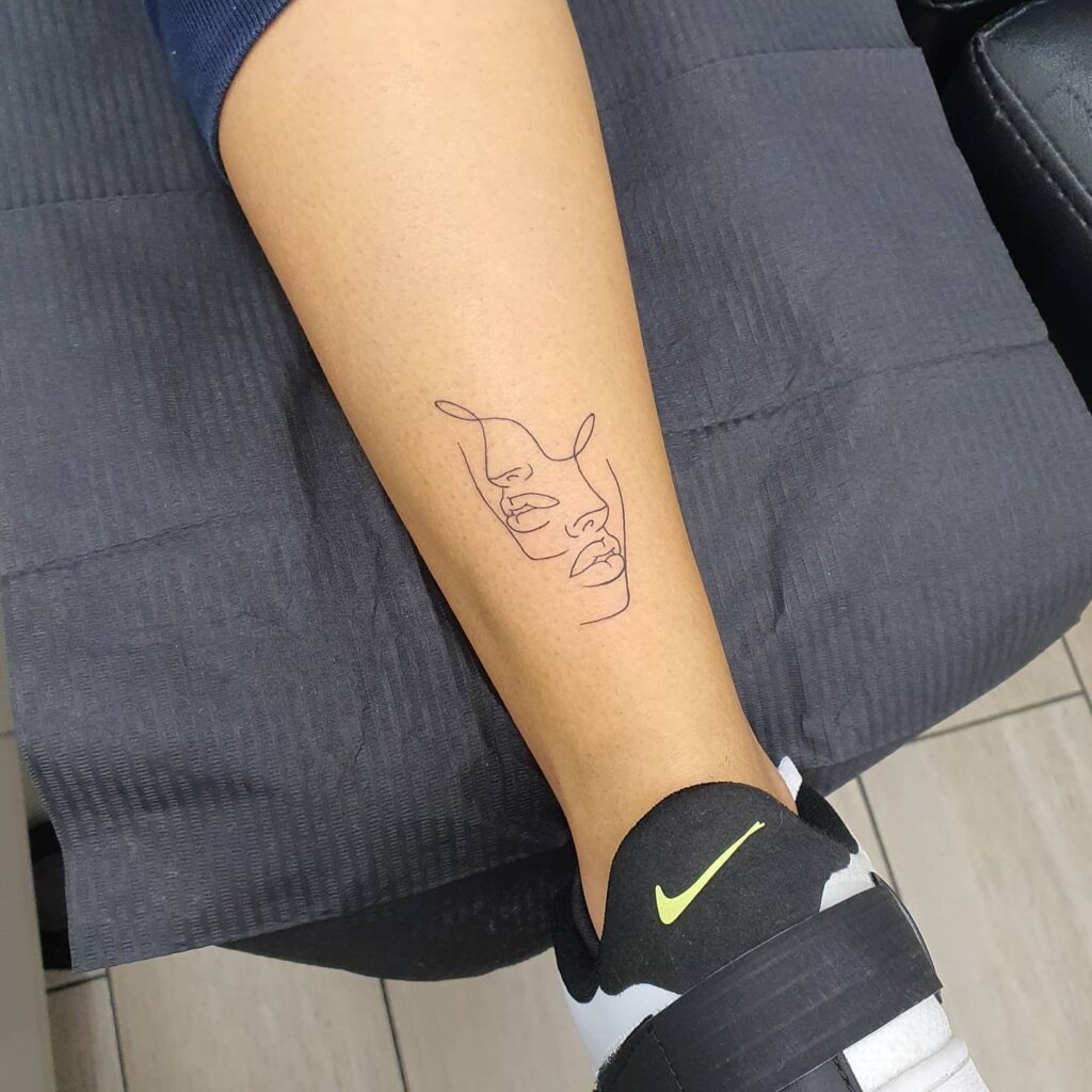 One Line Overlapping Faces Tattoo Tattoo Design
