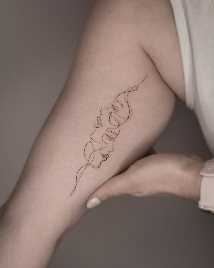 One Line Vertical Faces Tattoo Tattoo Design