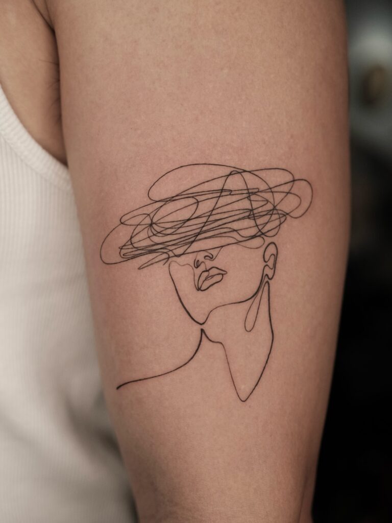 One Line Woman with Scribble Hat Tattoo Tattoo Design