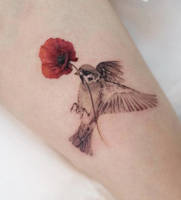Leaf-Winged Sparrow on Hand Tattoo Design
