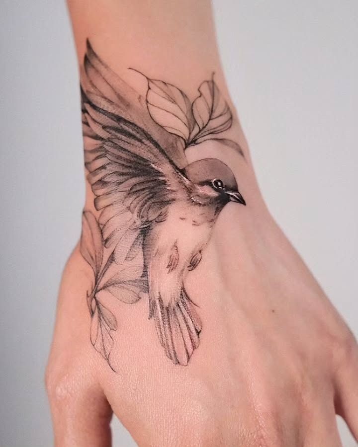 Miniature Sparrow on Wrist Tattoo Design