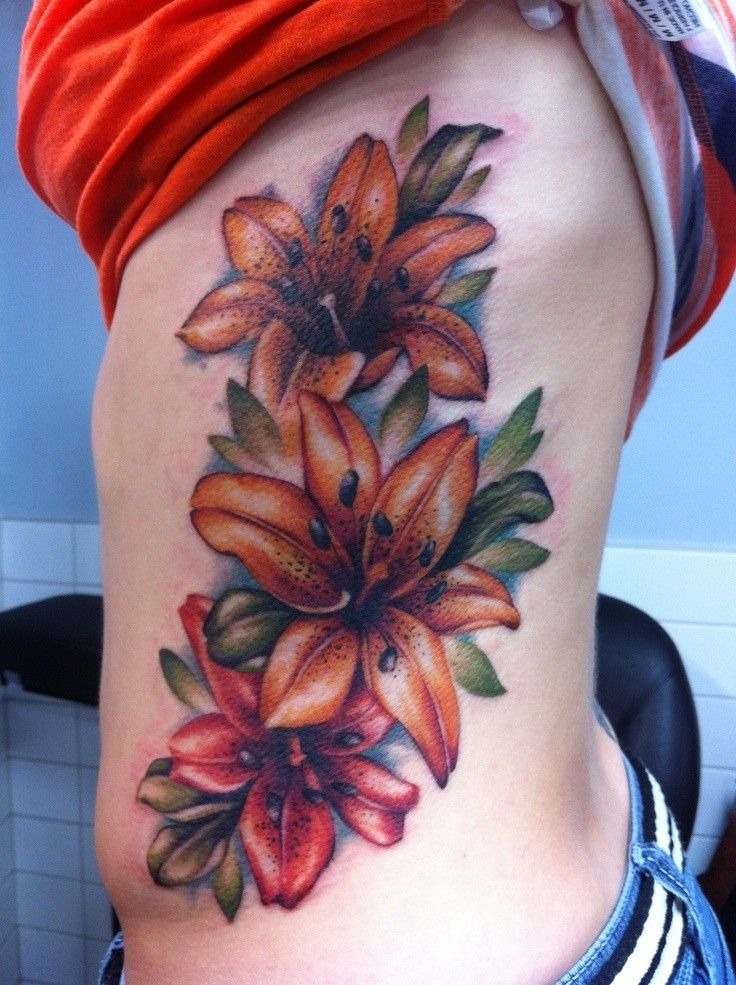 Flowing Tiger Lily Hip and Side Tattoo Tattoo Design