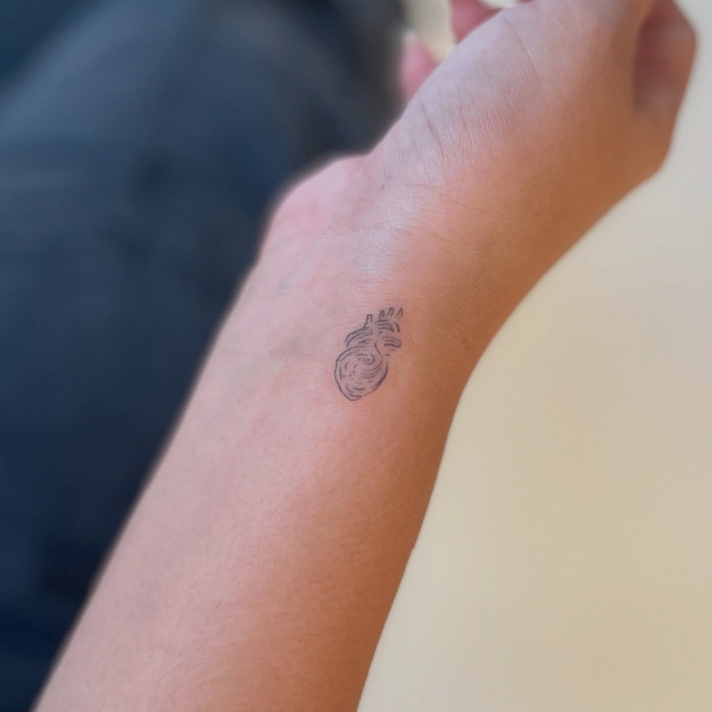 Tiny Anatomical Heart Wrist Tattoo Tattoo Design