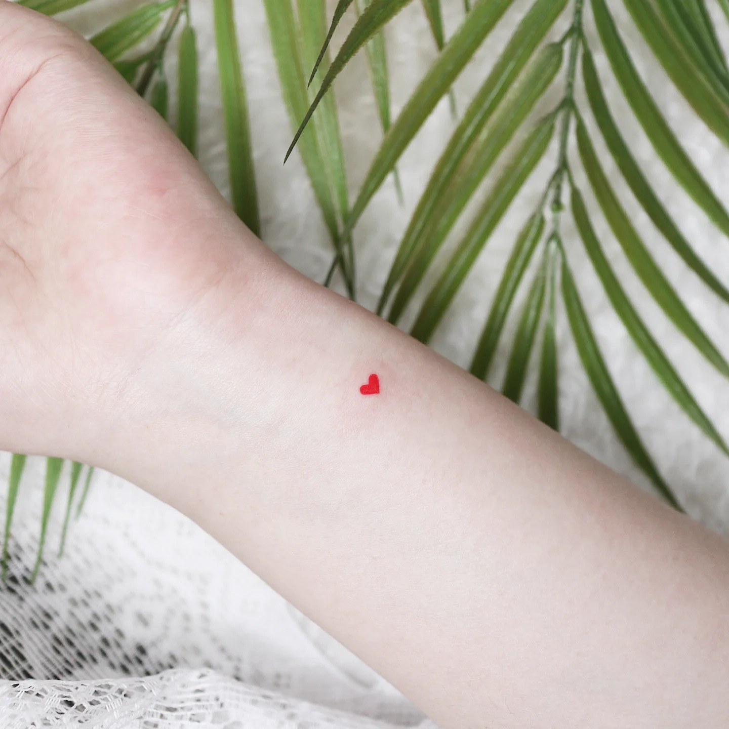 Tiny Red Heart Wrist Tattoo Tattoo Design