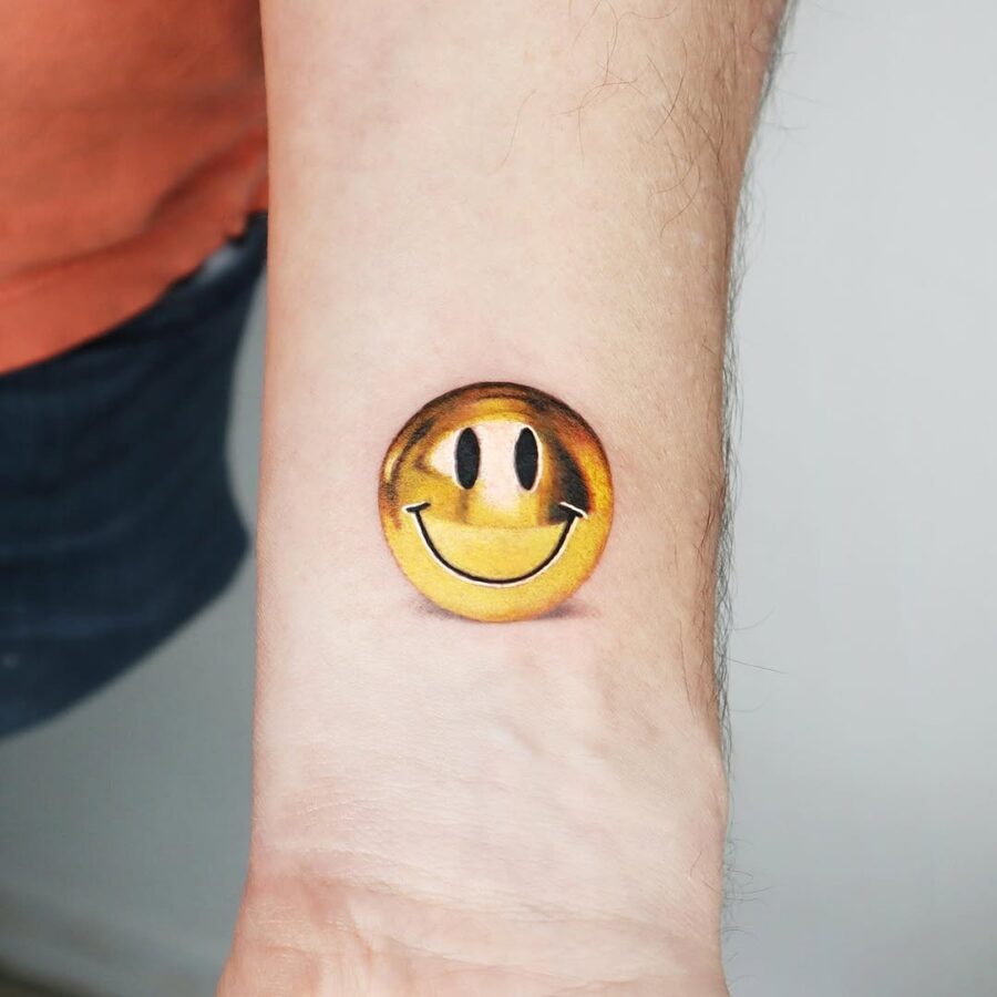 Charming and cheerful smiley face tattoo Tattoo Design
