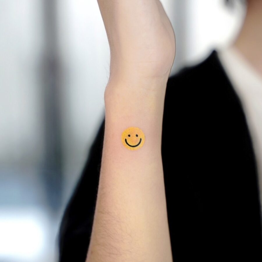 Charming Smiley Face Tattoo on Forearm Tattoo Design