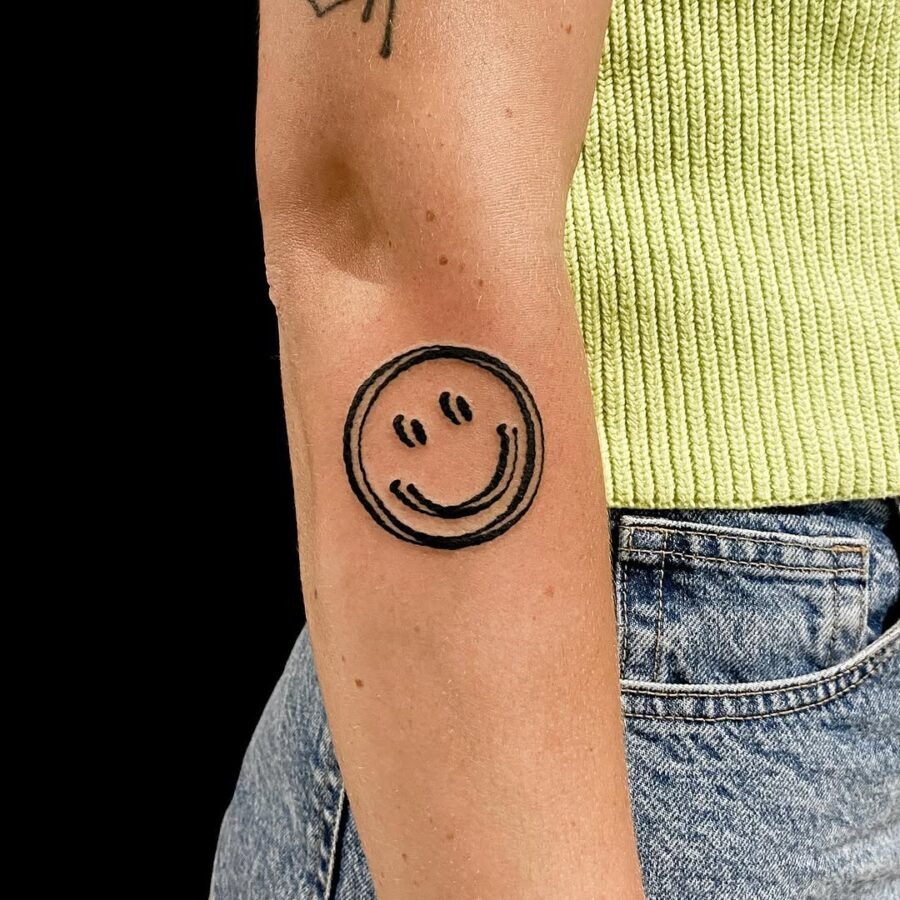Charming smiley face tattoo radiating positivity Tattoo Design