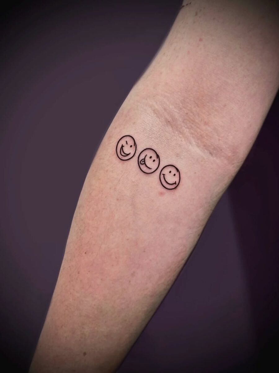 Charming smiley face tattoo trio design Tattoo Design
