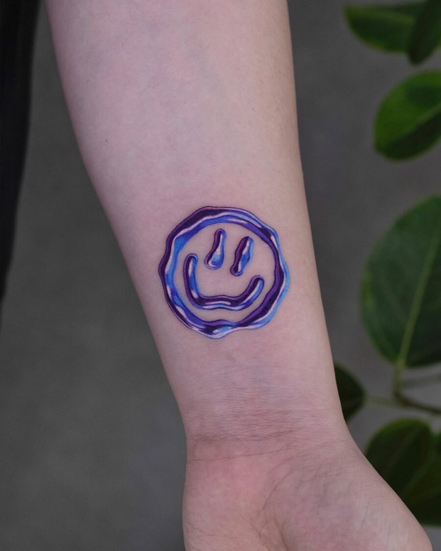 Colorful Smiley Face Tattoo with Wavy Lines Tattoo Design