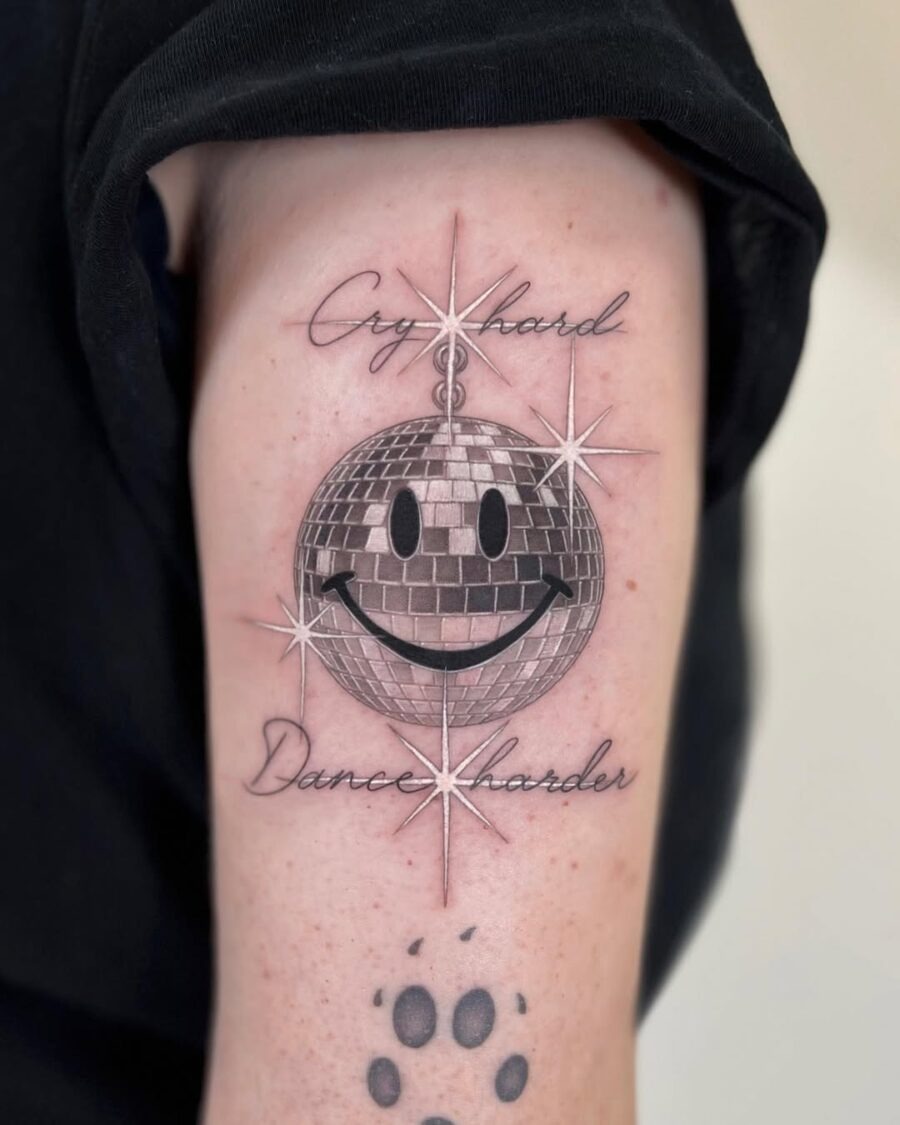 Playful smiley face disco ball tattoo design Tattoo Design