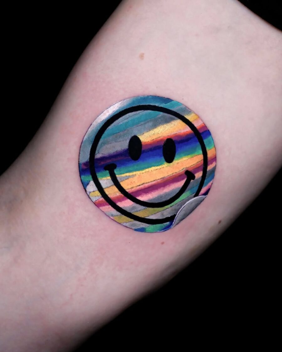 Vibrant smiley face tattoo with playful stripes Tattoo Design