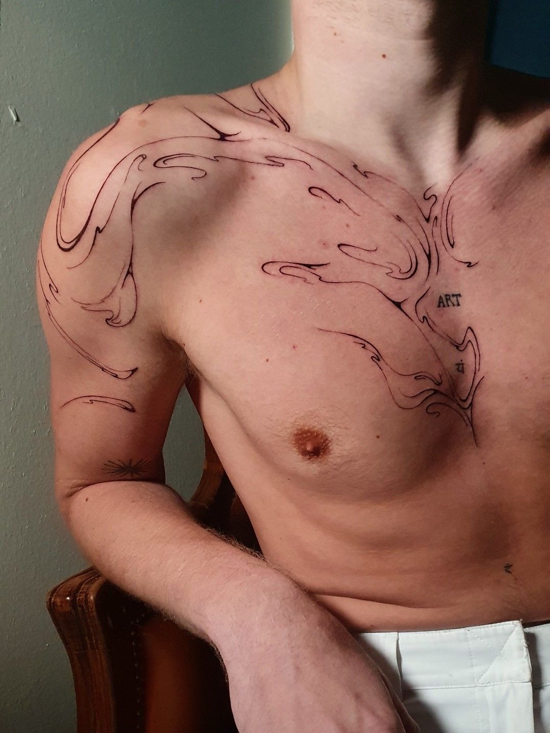 Chest and Shoulder Smoke Flow Tattoo Design