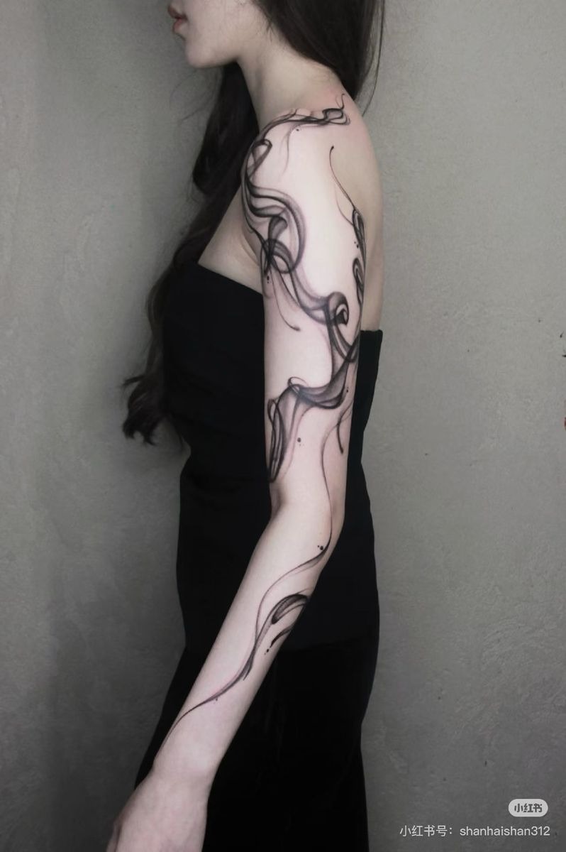 Ethereal Full-Arm Smoke Wrap Tattoo Design