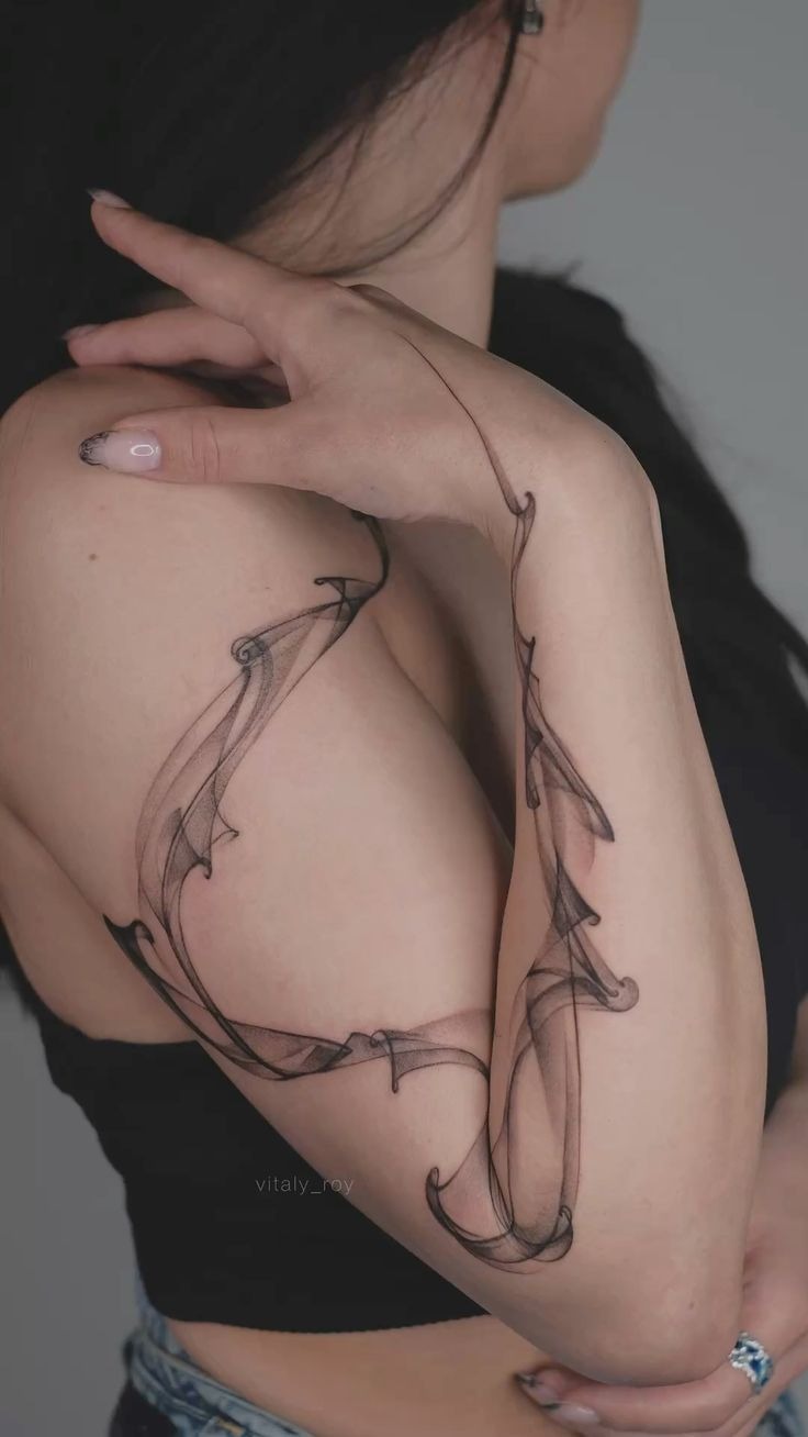 Sculpted Smoke Arm Loop Tattoo Design
