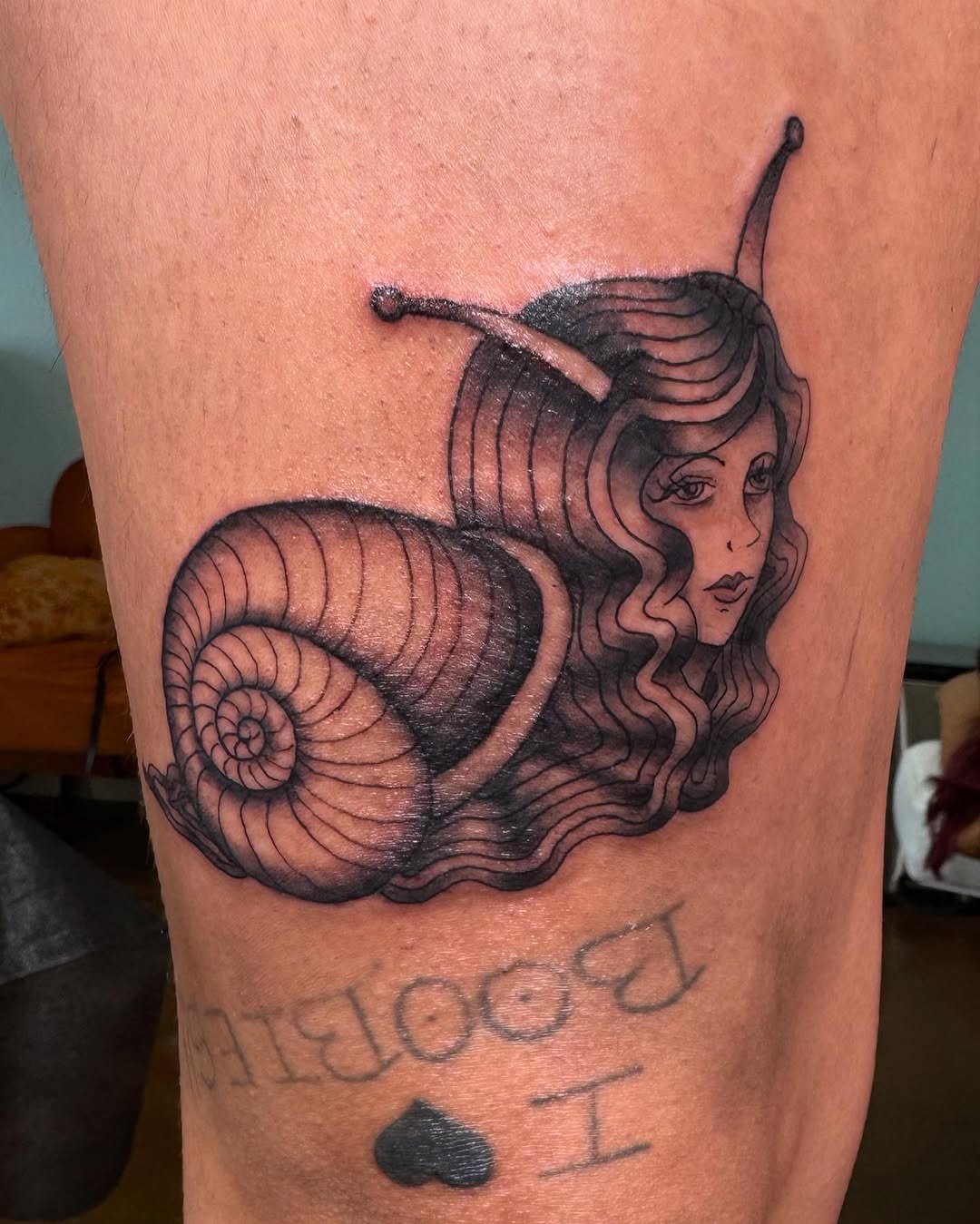 Ethereal snail tattoo blending beauty and nature Tattoo Design