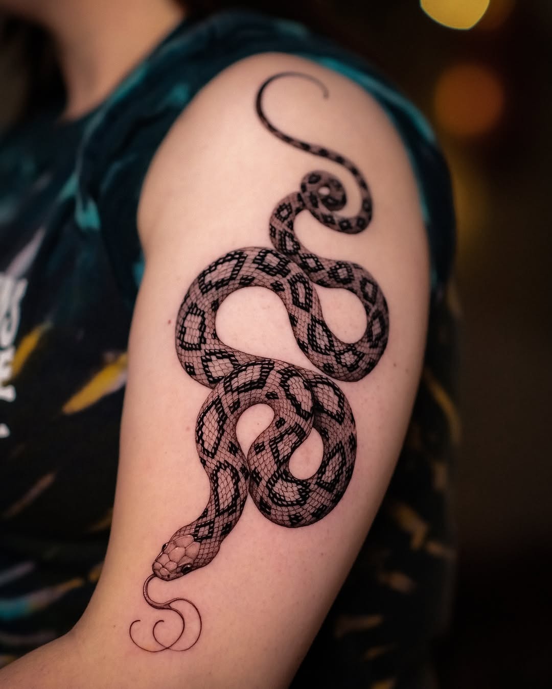 Detailed snake tattoo with intricate scales Tattoo Design