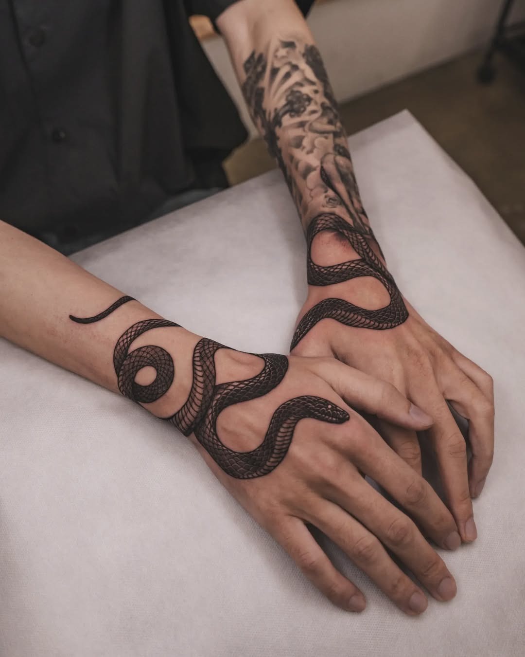 Intricate black snake tattoos on hands Tattoo Design