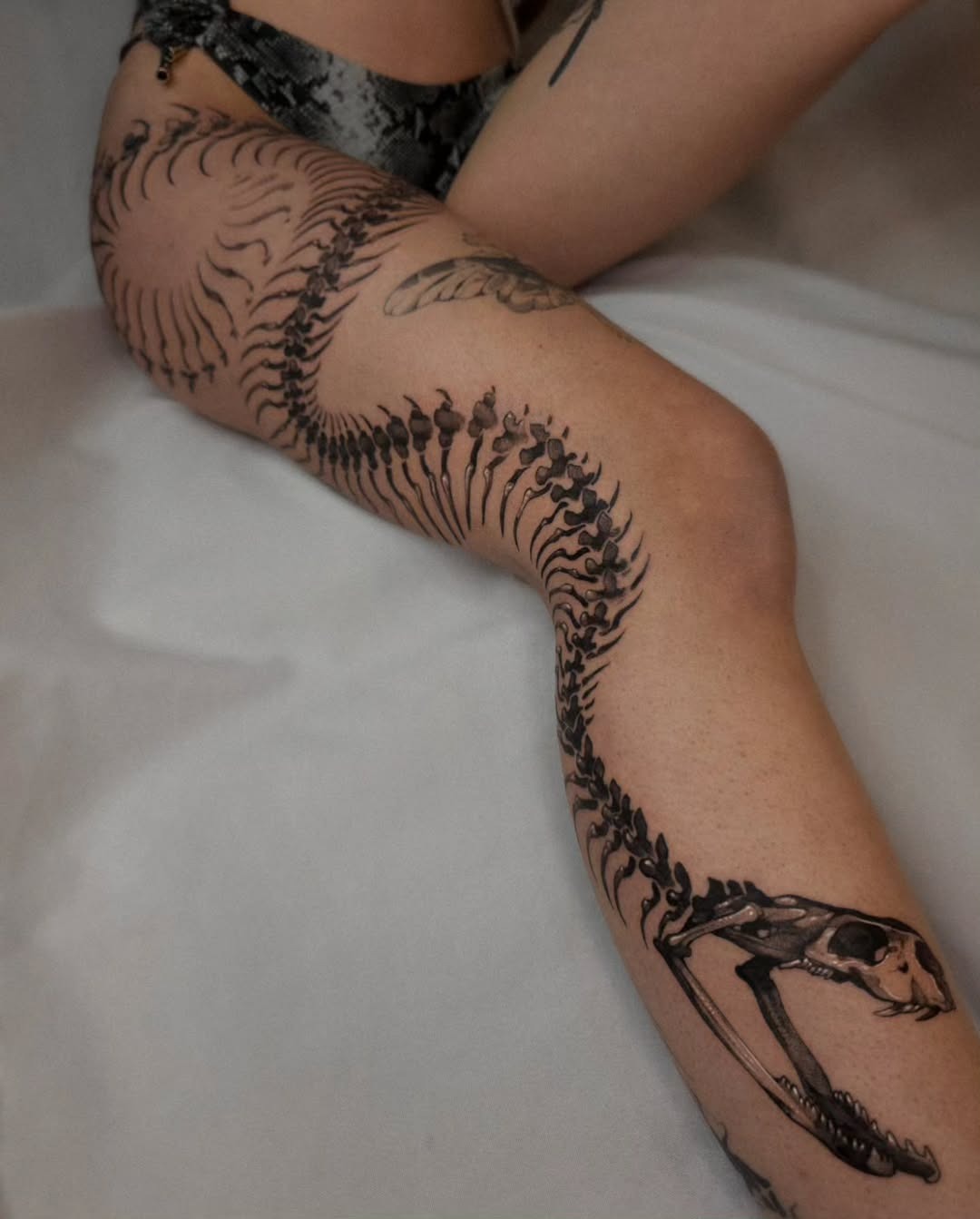Intricate spine design showcasing a snake’s elegance Tattoo Design
