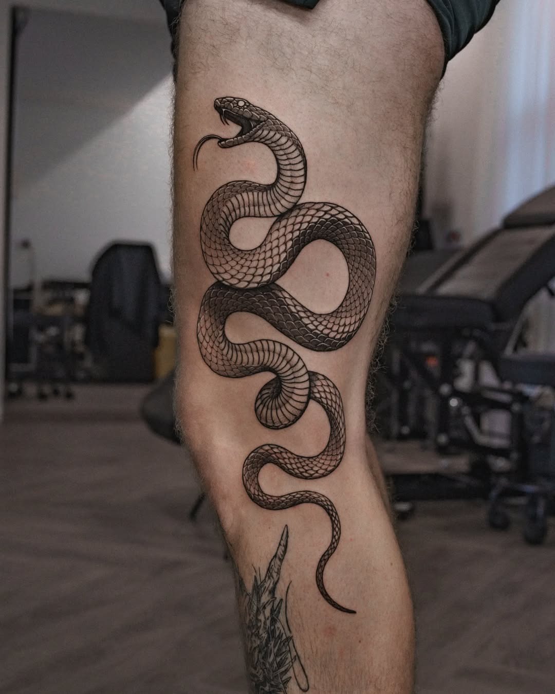 Stylish snake tattoo that slithers elegantly Tattoo Design