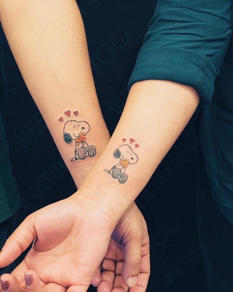 Matching Snoopy Hug Tattoos For Couples Tattoo Design