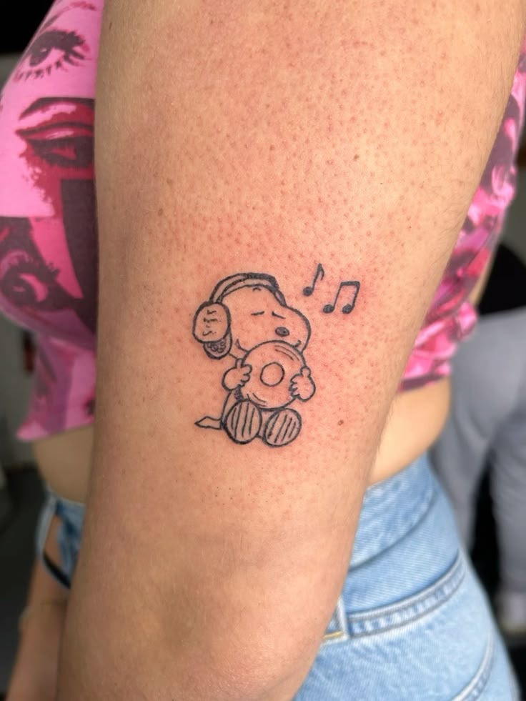 Music-Loving Snoopy Donut Tattoo Tattoo Design