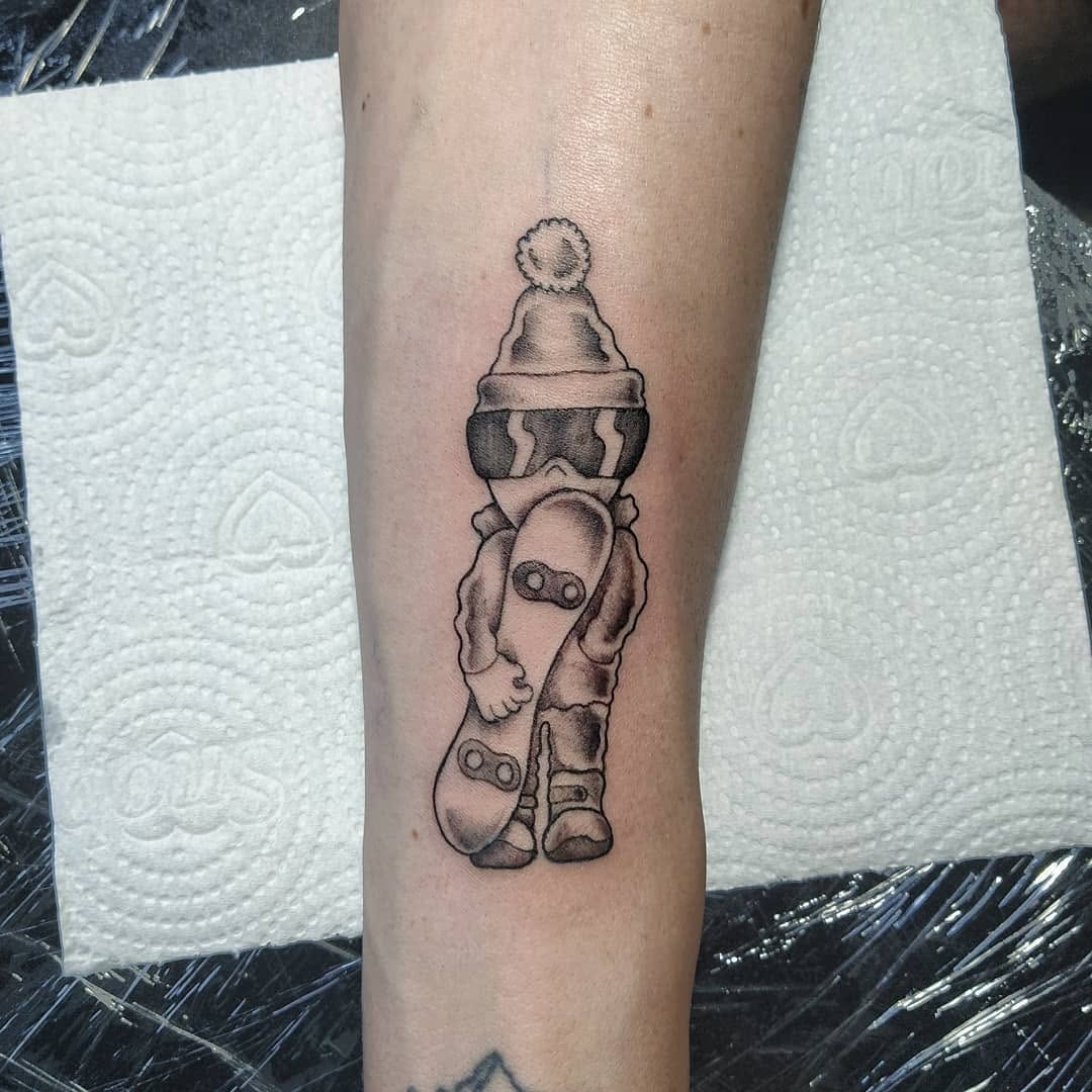 Playful snowboarder tattoo for snow lovers Tattoo Design