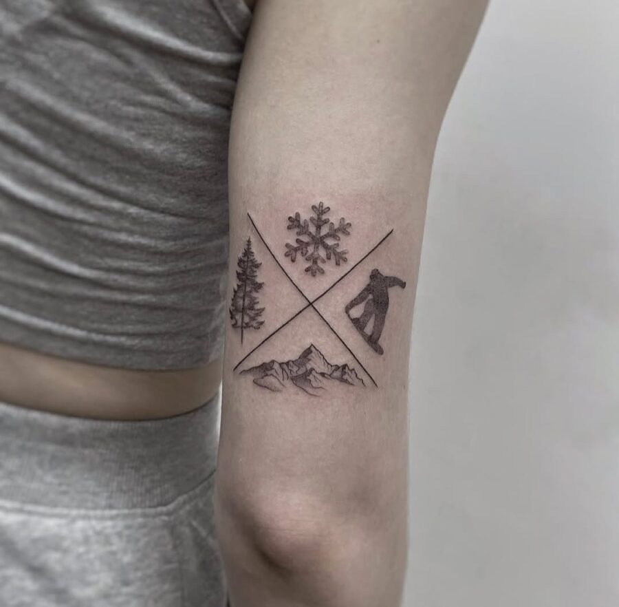 Stylish tattoo showcasing winter sports elements Tattoo Design