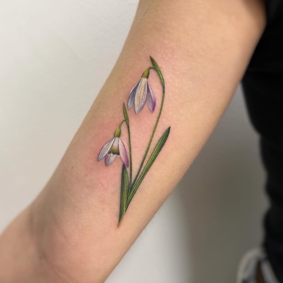 Beautiful snowdrop tattoo with delicate blooms Tattoo Design