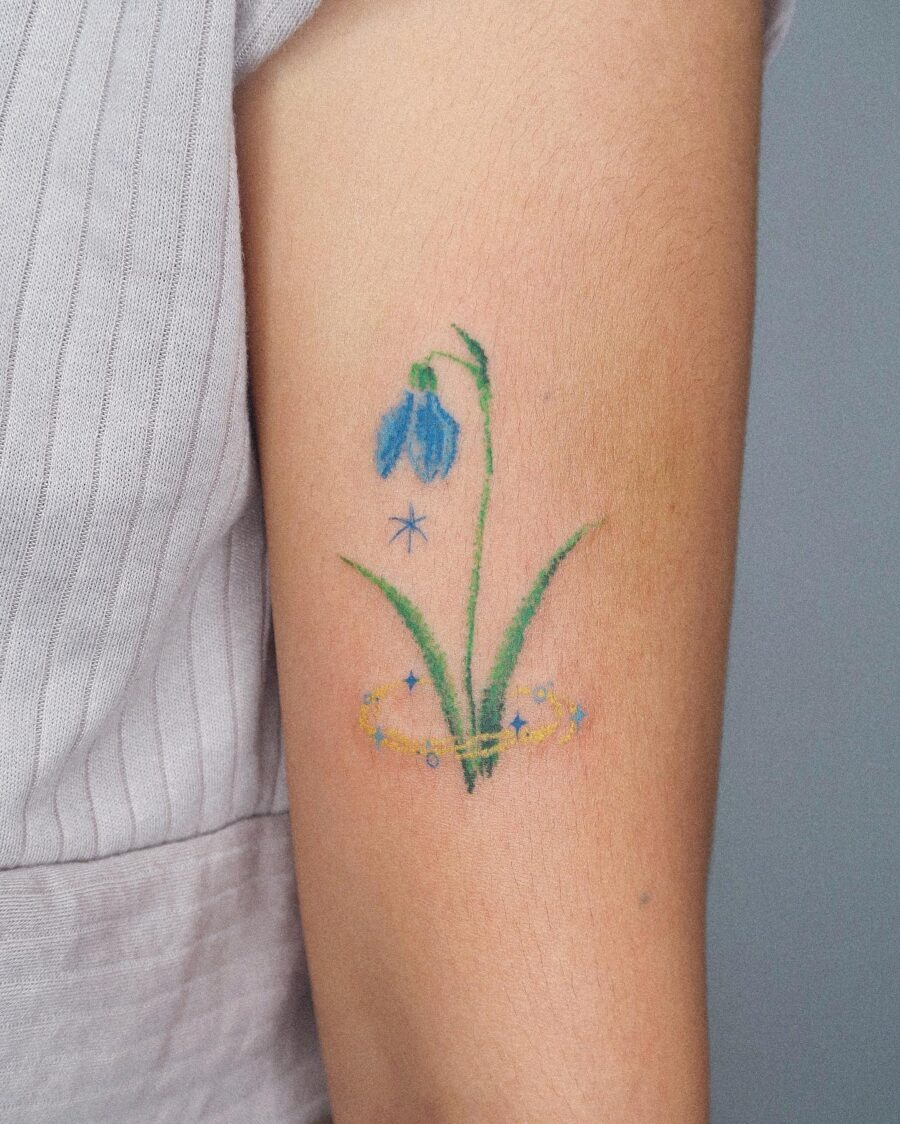 Delicate Snowdrop Flower Tattoo with Whimsical Touch Tattoo Design