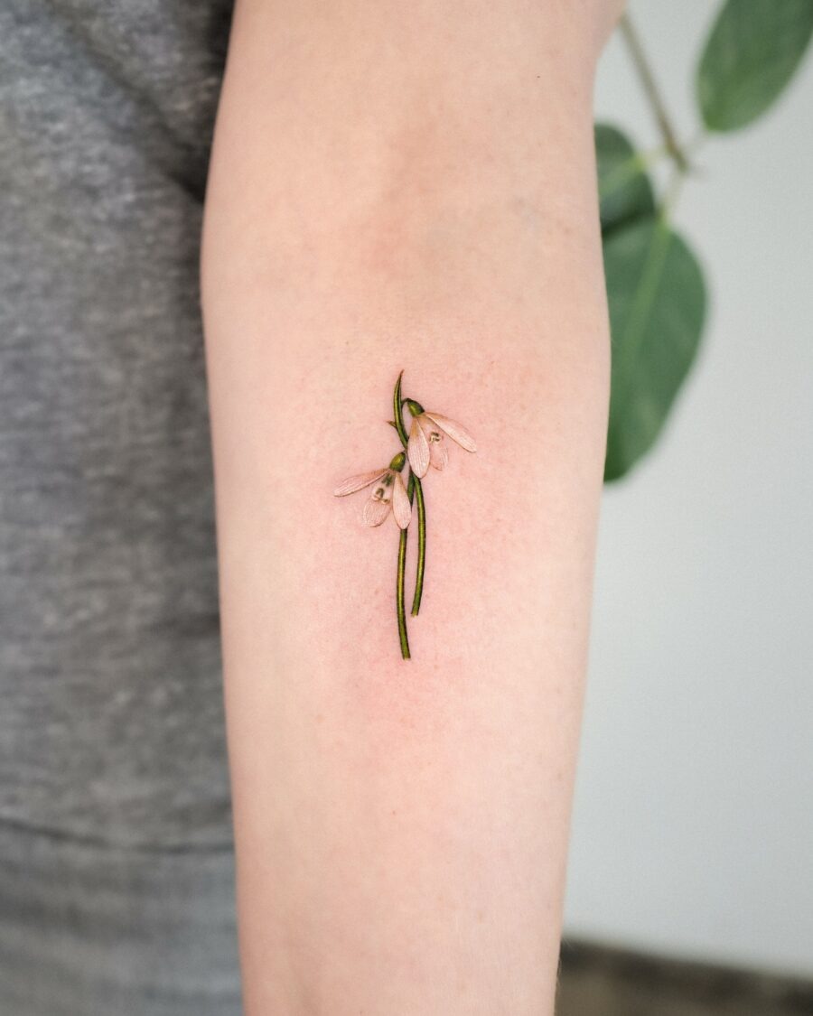 Delicate snowdrop tattoo on a forearm Tattoo Design